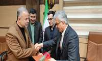 تکریم رئیس دانشگاه و مدیر حراست دانشگاه علوم پزشکی گیلان از جانبازان و فرزندان شهدا  
